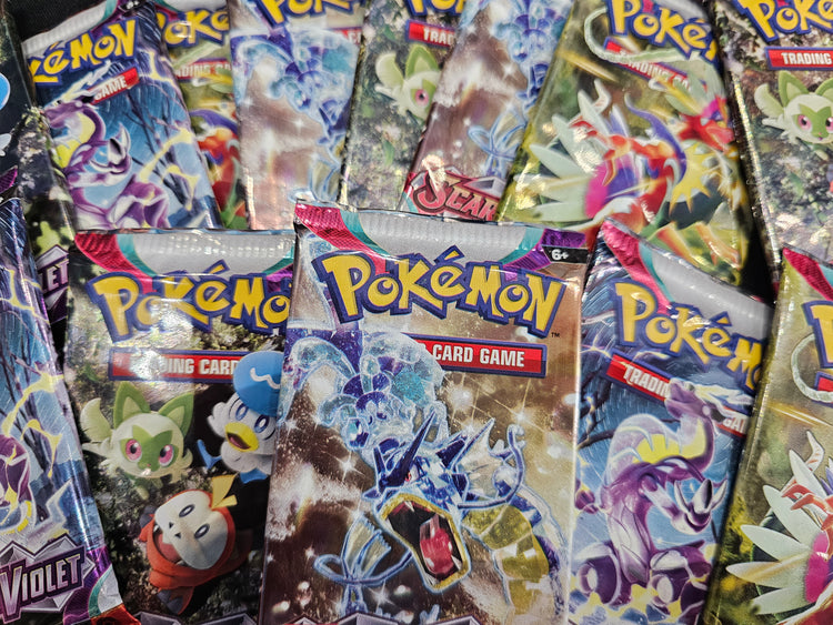 Pokémon TCG cards and sealed booster packs at Long Box Silver's Comics in Guelph
